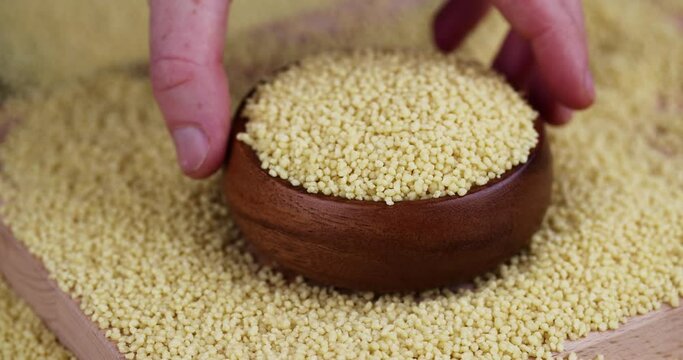 Take a bowl of raw cereal porridge couscous from wheat or millet