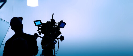 Video or film production studio used in shooting videography or photography and photo sets. Professional movie camera and film crew team making film scenes for cinema TV or online advertising works.