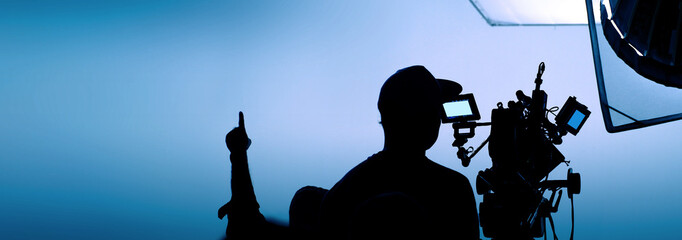 Video or film production studio used in shooting videography or photography and photo sets. Professional movie camera and film crew team making film scenes for cinema TV or online advertising works. © gnepphoto