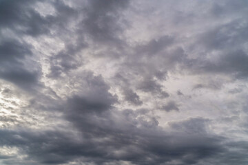 Gloomy sky with gray cumulus rain clouds during the day 10-12 hours in the middle latitudes.