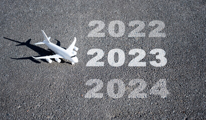 Toy aircraft and calendar years on the runway
