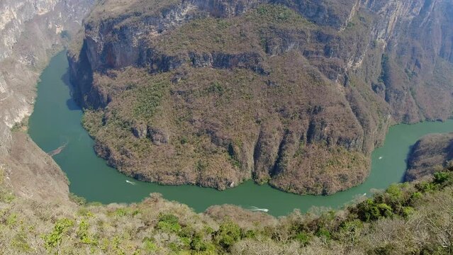 Beautiful top view of Sumidero Canyon in Chiapas Mexico with a boat rides on the river