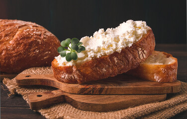 Sandwich, with cream cheese, homemade, on a cutting board, rustic style, no people, selective focus, breakfast