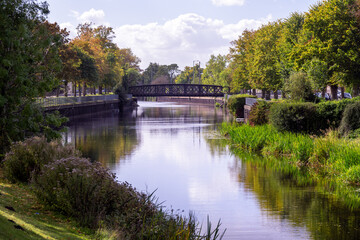 Fototapeta na wymiar Disused metal railway bridge over the river Welland In Spalding, Lincolnshire, East Midlands, England