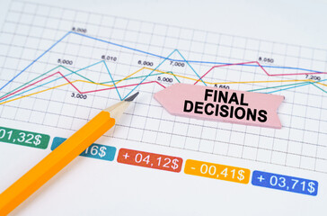 On business charts there is a pencil and an arrow sticker with the inscription - Final Decisions