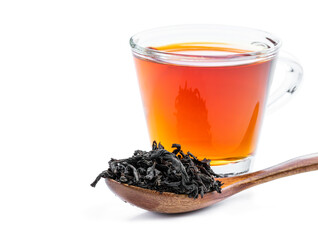 Black tea in glass cup isolated on white
