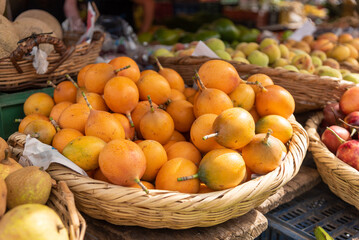 Sales basket of granadillas in a peasant market in Colombia.