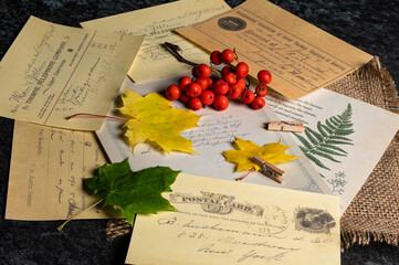 old letter with rose and post it - obrazy, fototapety, plakaty