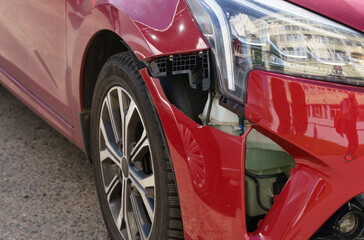 Obraz na płótnie Canvas Broken car bumper after a collision. After the crash.