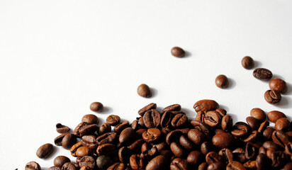 brown coffee beans on white background with space for text, coffee wallpaper, roasted coffee beans texture on white, roastet coffee beans background