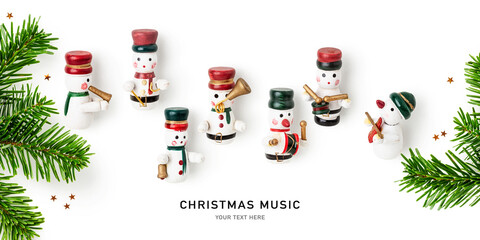 Snowmen playing music instruments and fir tree branch. Christmas decoration  .