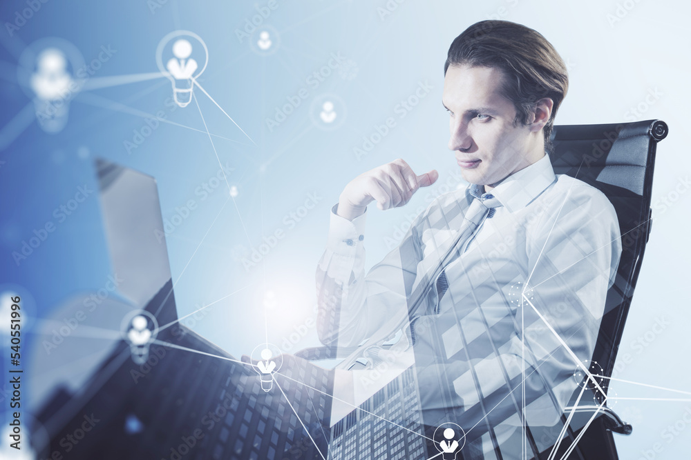 Aufkleber businessman sitting on chair and using laptop computer with abstract glowing people and light bulb n