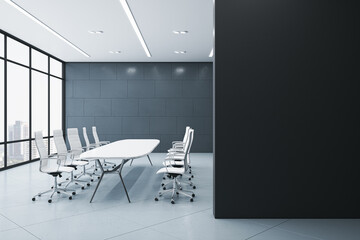 Modern minimalistic concrete meeting room interior with blank black mock up place on wall, furniture, window and city view. Workplace concept. 3D Rendering.