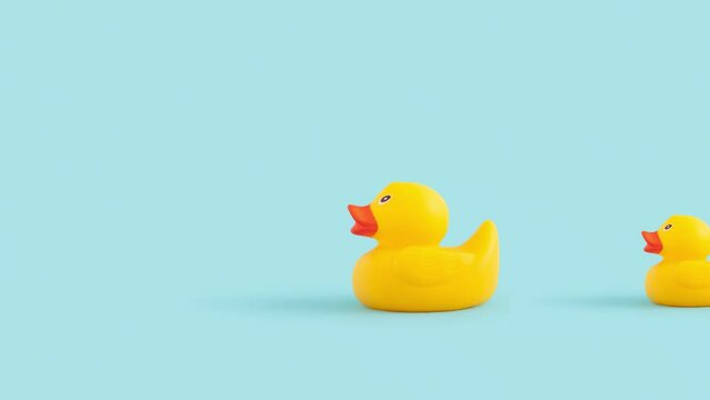 Minimal concept with yellow ducks toy in a row 4k.