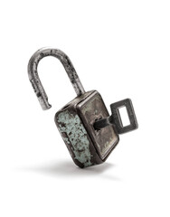 Opened vintage padlock and key on white background