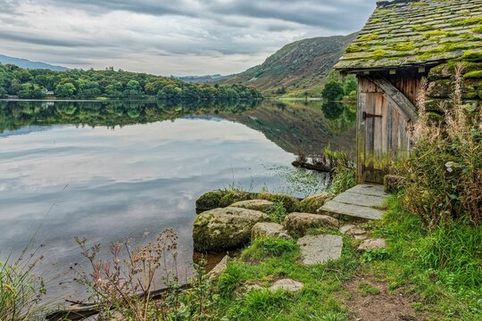 Beautiful shot of a boat house b a lake