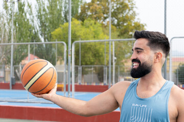 Young Men Playing Basket Outside