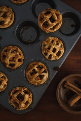 Mini Apple Pie Tarts in dark style food image