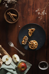 Mini Apple Pie Tarts in dark style food image