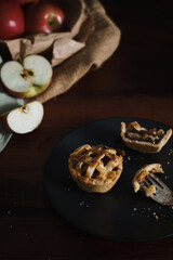 Mini Apple Pie Tarts in dark style food image