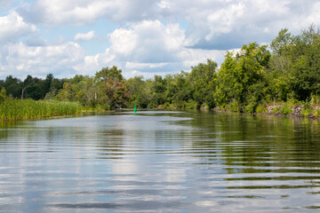 Green navigation marker on the Tay River in Perth, Ontario, Canada