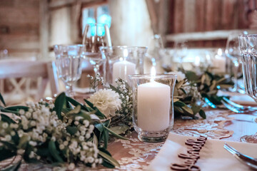 Wedding floral decoration on table in rustic style