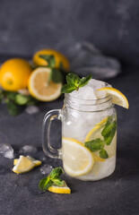 fresh lemon cocktail on a dark background