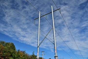 High voltage power line on galvanized round metal post