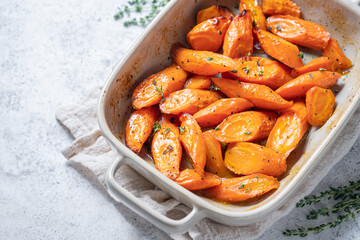 Honey coasted and glazed roasted carrots. Tasty and delicious vegetable side dish.