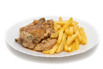 A plate of garlic chicken with pommes frites. On white background. Spanish food concept.