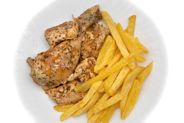 A plate of garlic chicken with pommes frites. On white background. Spanish food concept.