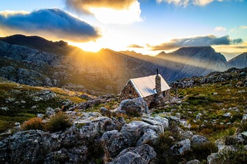Scenic view of the sunset over a mountain hut in the Fonteintjiesberg Nature Reserve, South Africa