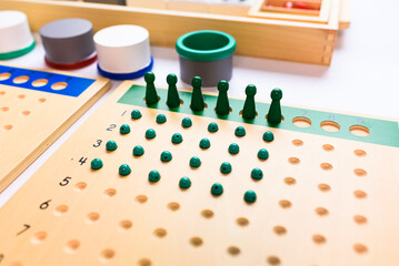 The division board in montessori is a mathematical material to learn in an alternative way.