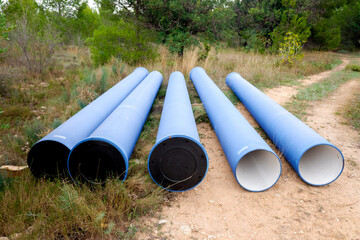 Large modern PVC pipes to channel urban sanitation water, before being installed.
