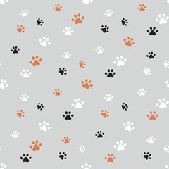 Kids vector cartoon nursery seamless pattern with paw prints colorful on grey background - 540572597