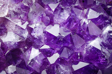amethyst bright macro detail texture background. close-up raw rough unpolished semi-precious  druse...