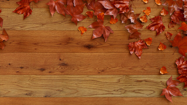 Thanksgiving Wallpaper with Fall leaves on Natural wood Tabletop.