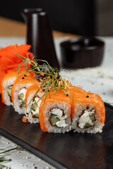 Sushi Philadelphia on a stone decorative plate