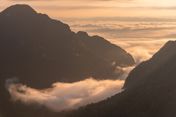 Range of mountain and sea mist among beautiful sunrise 