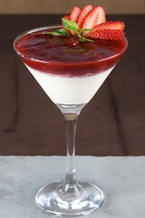 white sweet strawberry ganache with lemon zest served in a glass bowl