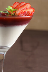 white sweet strawberry ganache with lemon zest served in a glass bowl
