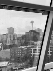 Seattle skyline on a rainy day through a cruise ship window