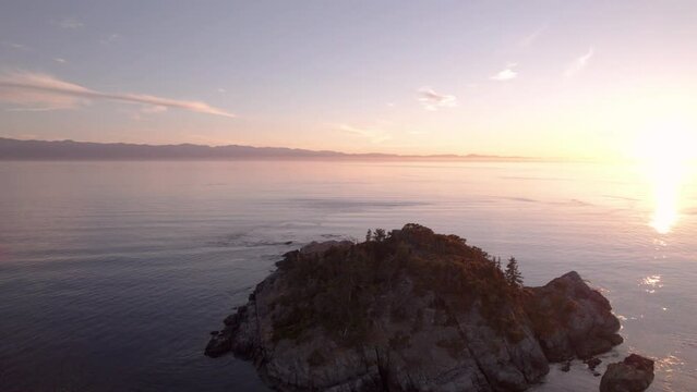 Aerial sunset, sunset drone footage of coastline of Vancouver Island, Sooke BC. 4K PRORES 422 24FPS