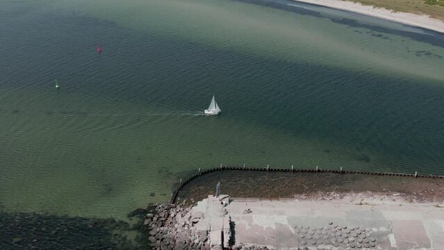 Drone view of the  white yachts driving on the water, Fehmarn island, Germany, aerial