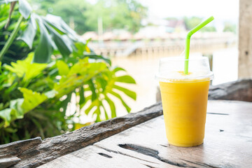 mango smoothies in take away glass