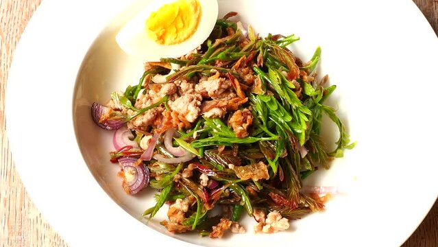 Young tamarind leaves salad , Thai northern famous food.