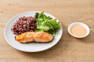 grilled salmon fillet steak with rice berry and vegetable
