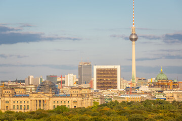 Berlin cityscape skyline over Tiergarten at peaceful sunset, Germany