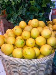 pile of lemon in the basket at supermarket