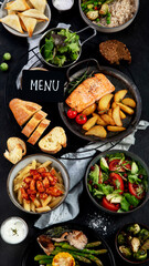 Table of various healthy food dishes. Healthy food assortment. Dieting concept.